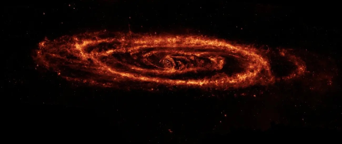 Телескоп «Спитцер» объяснил «пищевые привычки» сверхмассивной черной дыры