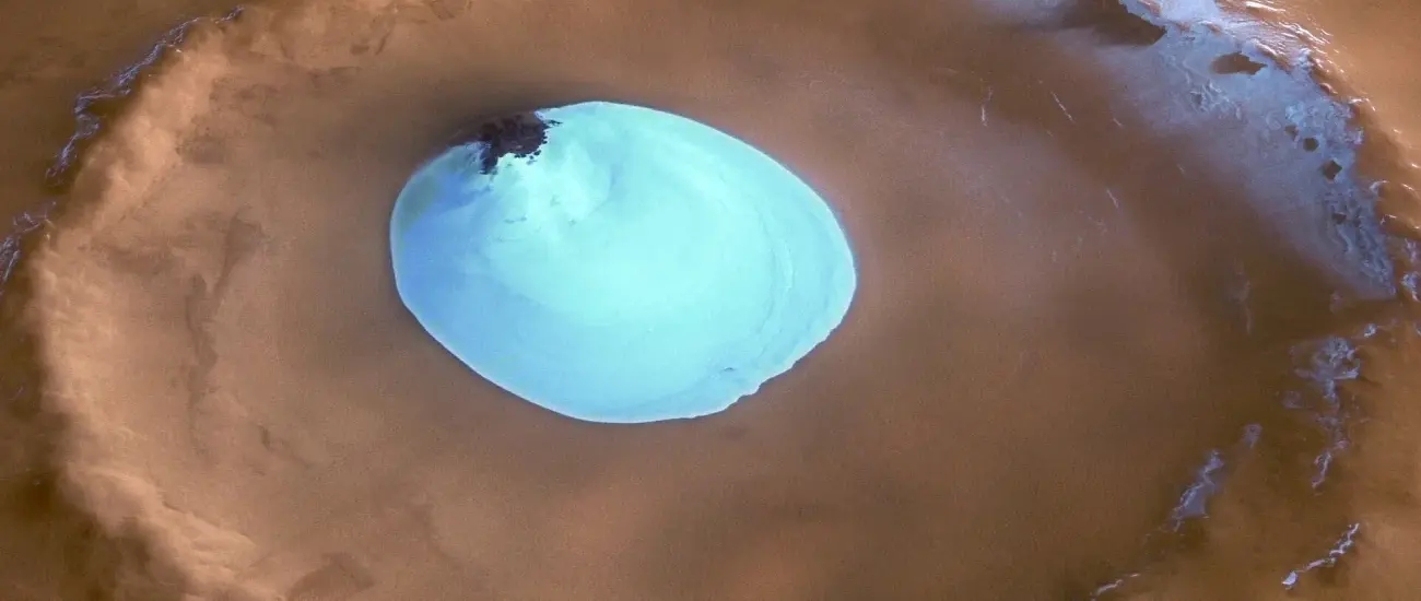В кальдерах марсианских вулканов обнаружили замерзшую воду